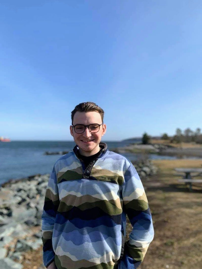 Picture of Matt Dorling with a coastal background
